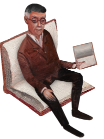 man reading a book and sitting on a book as a chair