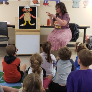 Amy leading storytime for kids
