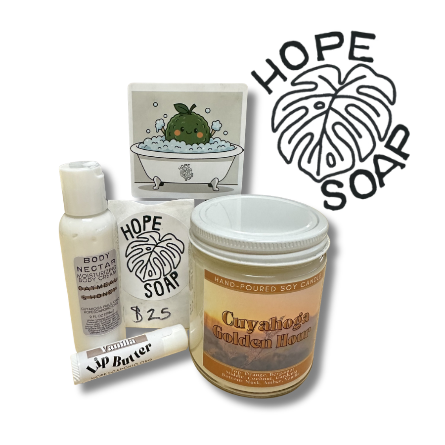 Hope Soap logo, coaster with a fruit in the bathtub, candle called Cuyahoga Golden Hour, gift card $25, lip butter, tube of moisturizer.